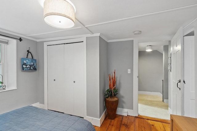 18 River St Unit 18, Andover, MA 01810 - bedroom with wood finished floors and a closet