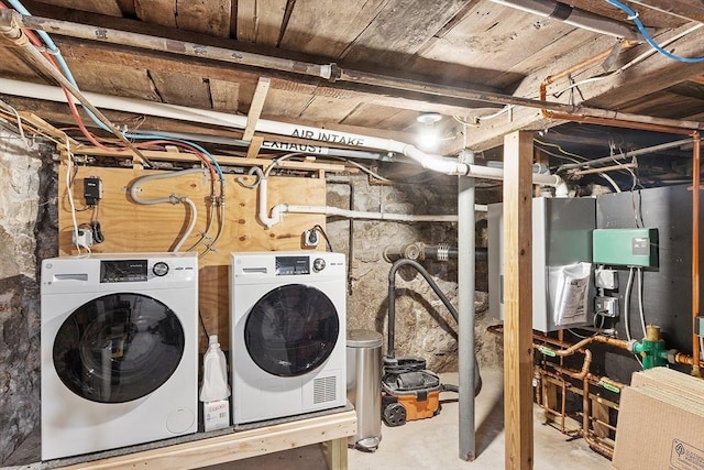 18 River St Unit 18, Andover, MA 01810 - washroom featuring washing machine and clothes dryer and heating unit