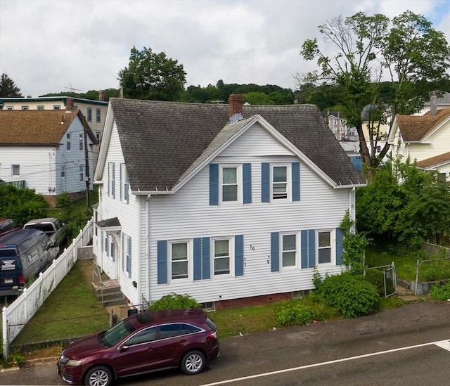 76 Blackstone River Rd, Worcester, MA 01607 - view of front of property featuring a shingled roof and a chimney