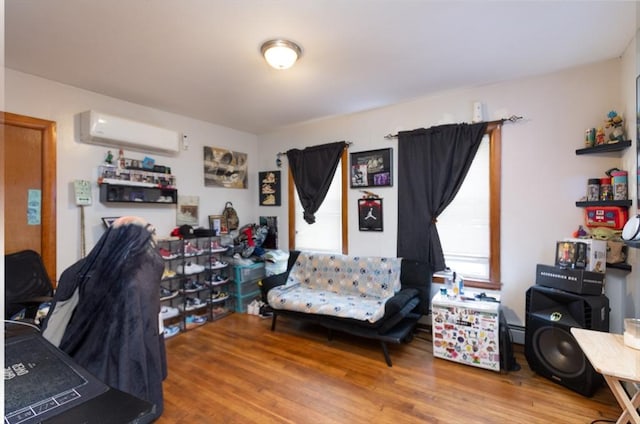 76 Blackstone River Rd, Worcester, MA 01607 - office area with a wall mounted air conditioner and wood finished floors