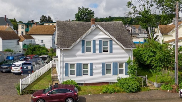 76 Blackstone River Rd, Worcester, MA 01607 - view of front of house featuring a chimney and a shingled roof