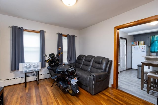 76 Blackstone River Rd, Worcester, MA 01607 - living area featuring baseboard heating and wood finished floors