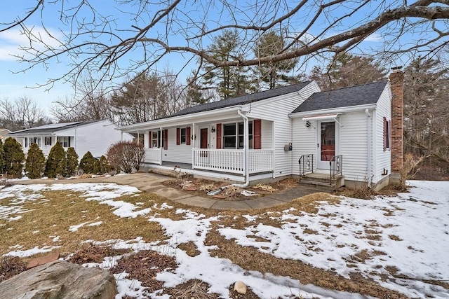 ranch-style house with covered porch