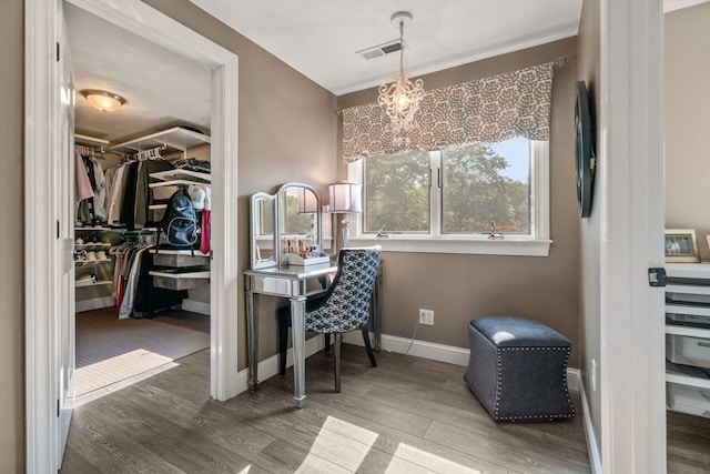 19 Buckmaster Dr, Sudbury, MA 01776 - office space with an inviting chandelier, baseboards, wood finished floors, and visible vents