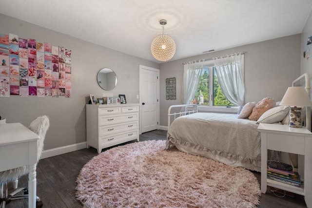 19 Buckmaster Dr, Sudbury, MA 01776 - bedroom featuring baseboards, dark wood-style flooring, and visible vents