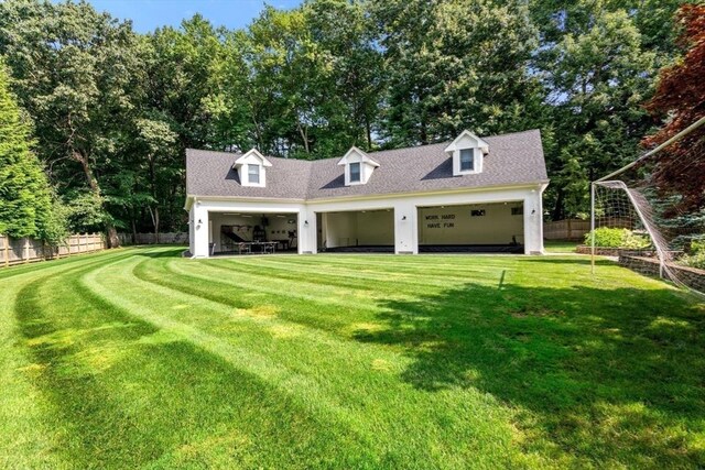 19 Buckmaster Dr, Sudbury, MA 01776 - garage featuring fence