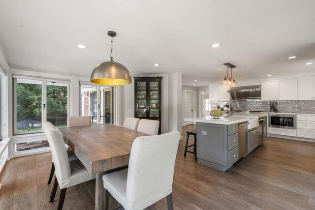19 Buckmaster Dr, Sudbury, MA 01776 - dining area with dark wood-type flooring and recessed lighting