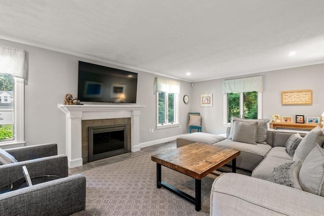 19 Buckmaster Dr, Sudbury, MA 01776 - living area featuring crown molding, plenty of natural light, and a tile fireplace