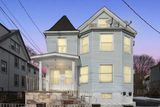 victorian-style house featuring a porch