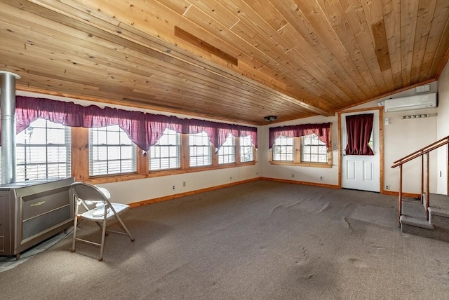 unfurnished room with carpet flooring, wooden ceiling, lofted ceiling, and an AC wall unit