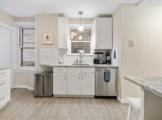 37 Grove St Unit 2, Boston, MA 02114 - kitchen featuring a sink, dishwasher, light wood-type flooring, and baseboards