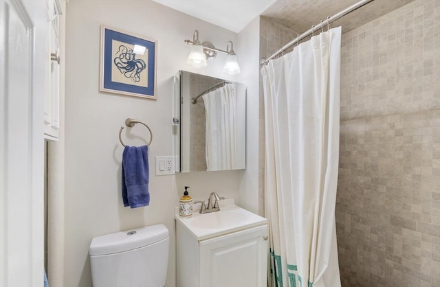37 Grove St Unit 2, Boston, MA 02114 - full bathroom with vanity, toilet, and a tile shower