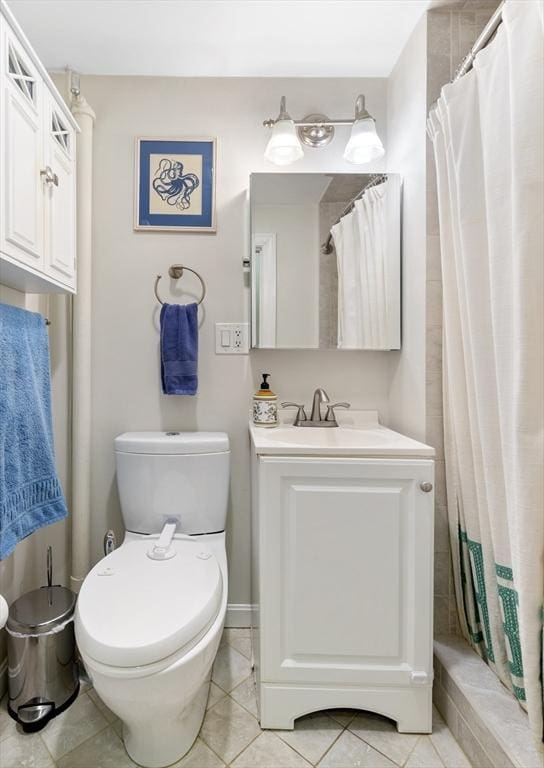 37 Grove St Unit 2, Boston, MA 02114 - bathroom featuring vanity, tile patterned flooring, toilet, and curtained shower