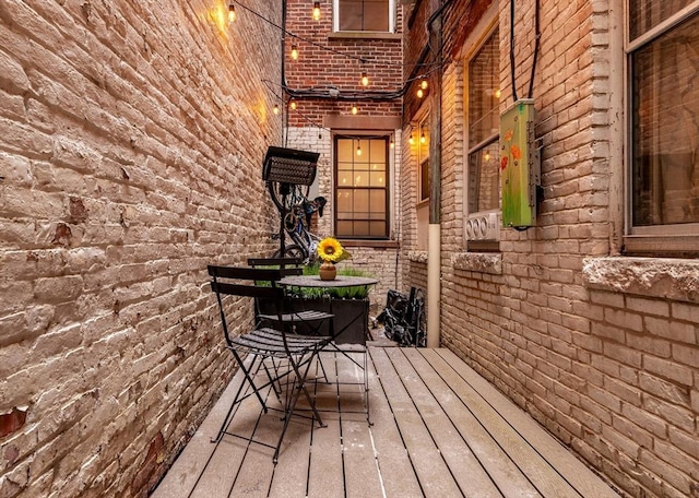 37 Grove St Unit 2, Boston, MA 02114 - wooden deck with outdoor dining area