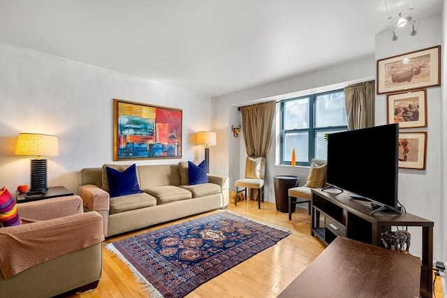 living area featuring light wood-style flooring