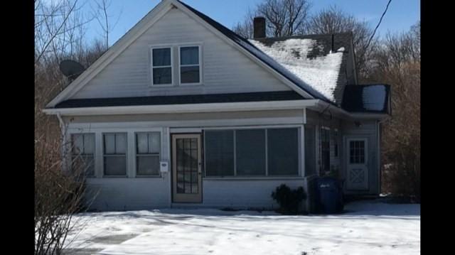 view of snow covered house