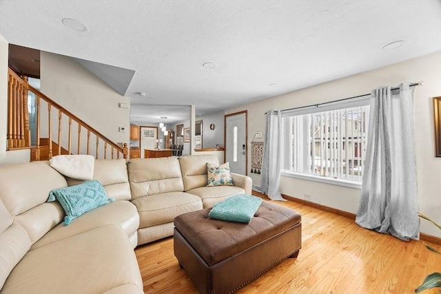 living room with light hardwood / wood-style floors