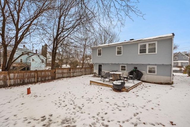 view of snow covered house