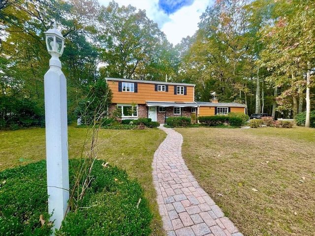 view of front of home with a front yard