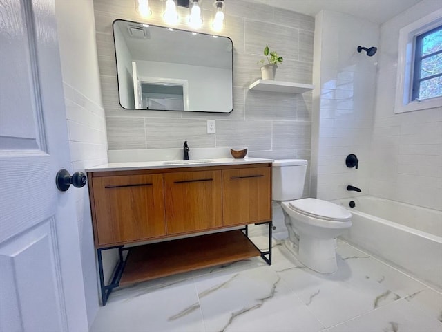 full bathroom with bathing tub / shower combination, vanity, tasteful backsplash, tile walls, and toilet