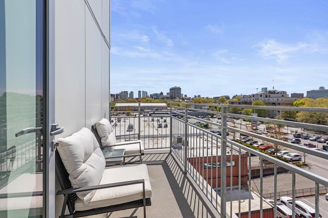 balcony featuring a view of city