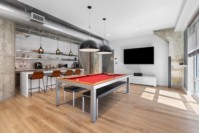 playroom with light wood-type flooring, pool table, and visible vents