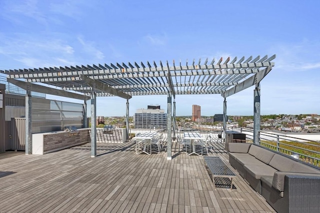 deck with outdoor lounge area and a pergola