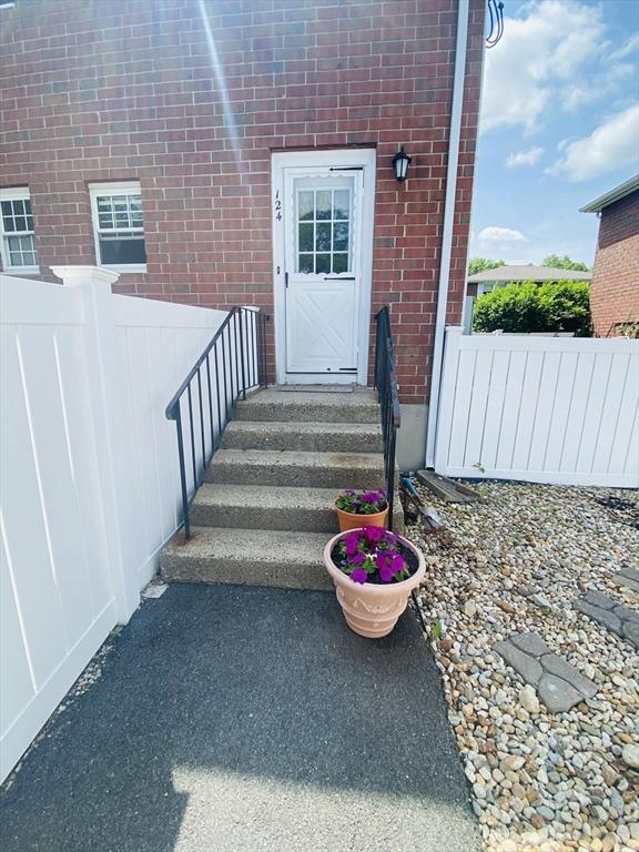 124 Kingston St Unit 124, North Andover, MA 01845 - entrance to property with brick siding