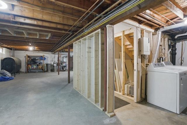 735 Union St, Leominster, MA 01453 - unfinished basement with oil tank and washing machine and clothes dryer