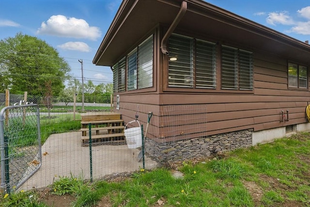 735 Union St, Leominster, MA 01453 - view of home's exterior featuring fence and a patio area