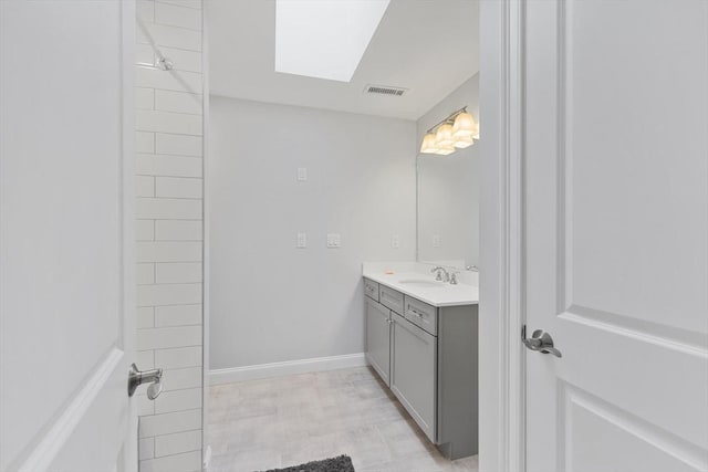 7 Garvey Rd Unit 7, Woburn, MA 01801 - full bathroom with a skylight and vanity