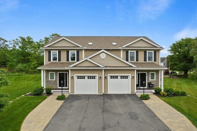 7 Garvey Rd Unit 7, Woburn, MA 01801 - view of front of home featuring driveway, a front lawn, roof with shingles, and stone siding