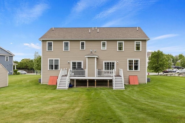7 Garvey Rd Unit 7, Woburn, MA 01801 - rear view of property with a wooden deck and a yard