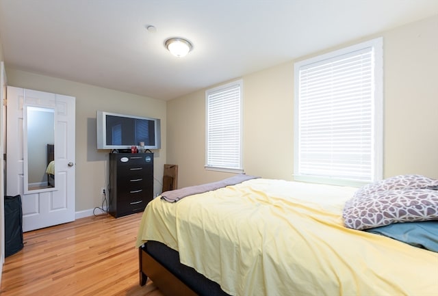 bedroom featuring hardwood / wood-style flooring