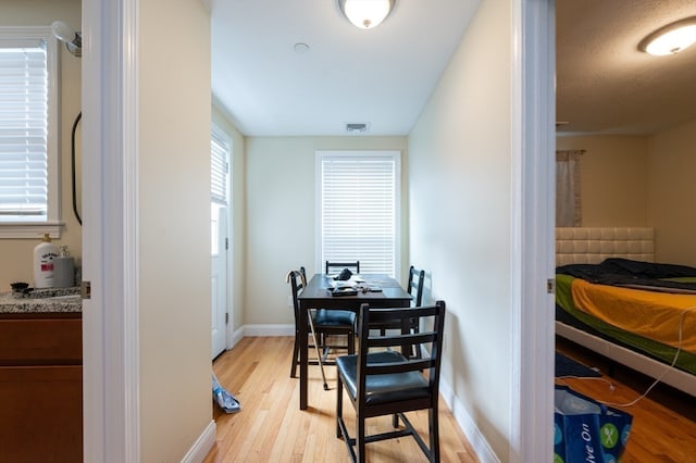 dining room with light hardwood / wood-style floors