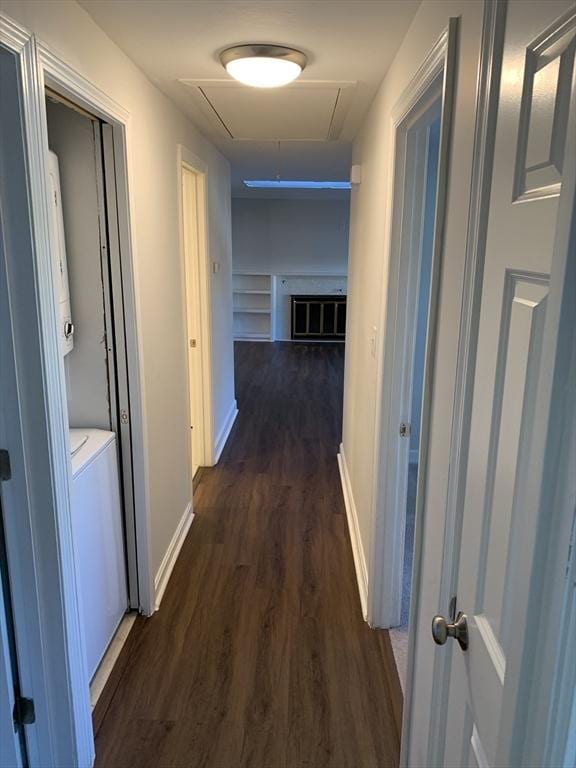 corridor featuring dark hardwood / wood-style flooring