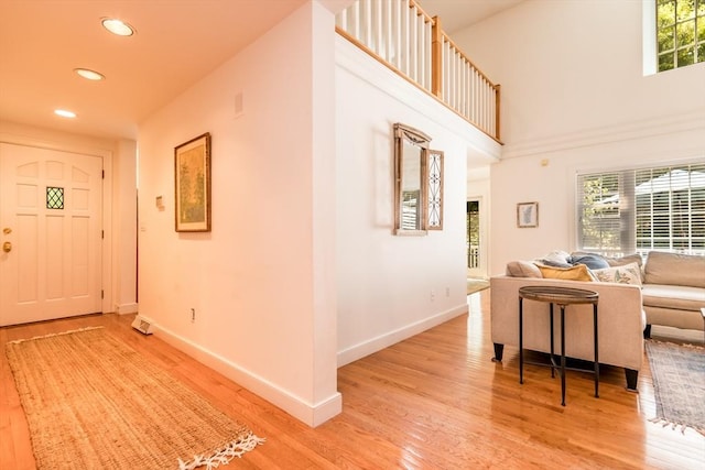 15 Hampton Ct Unit 15, Mashpee, MA 02649 - foyer featuring light wood-type flooring, recessed lighting, and a towering ceiling