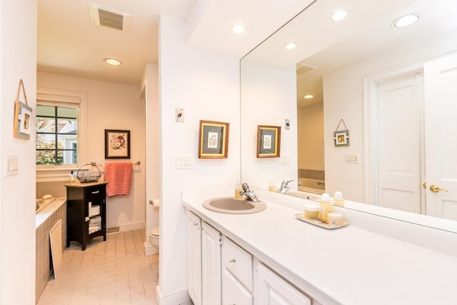 15 Hampton Ct Unit 15, Mashpee, MA 02649 - full bathroom featuring vanity, a bath, tile patterned flooring, and recessed lighting