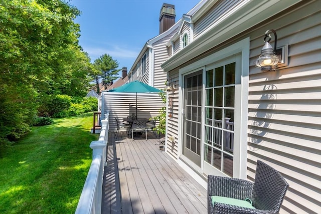 15 Hampton Ct Unit 15, Mashpee, MA 02649 - deck with a lawn and outdoor dining area
