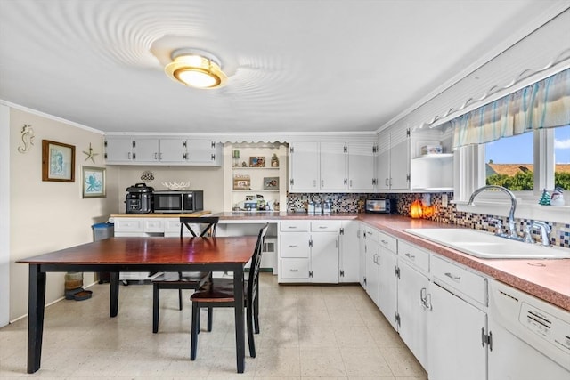 kitchen with dishwasher, sink, decorative backsplash, white cabinets, and ornamental molding