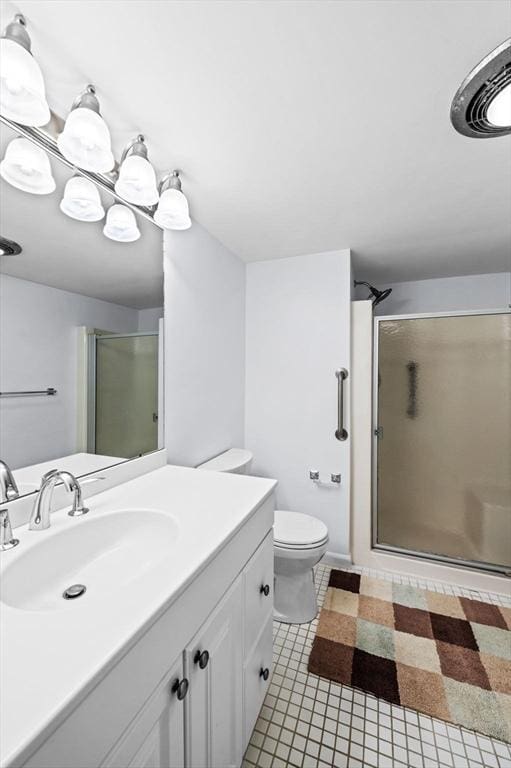 10 Freedom Holw Unit 10, Salem, MA 01970 - bathroom with a shower stall, vanity, and tile patterned flooring
