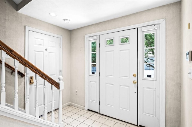 10 Freedom Holw Unit 10, Salem, MA 01970 - entryway with light tile patterned floors and stairway