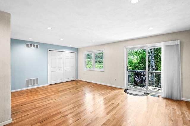 10 Freedom Holw Unit 10, Salem, MA 01970 - unfurnished living room with wood finished floors and recessed lighting