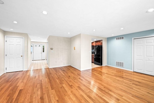 10 Freedom Holw Unit 10, Salem, MA 01970 - unfurnished living room featuring light wood finished floors and recessed lighting