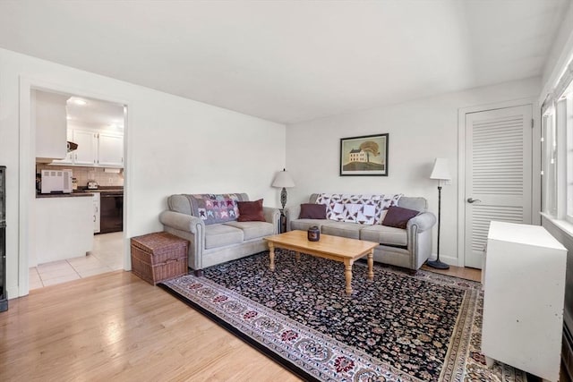 living area featuring light wood-style flooring