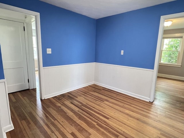 65 Franklin Rd, Longmeadow, MA 01106 - empty room with hardwood / wood-style flooring and wainscoting
