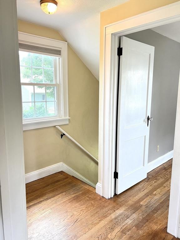 65 Franklin Rd, Longmeadow, MA 01106 - stairs featuring lofted ceiling and wood finished floors