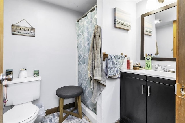 17 Barnard Rd, Lawrence, MA 01843 - full bath with toilet, vanity, and baseboards