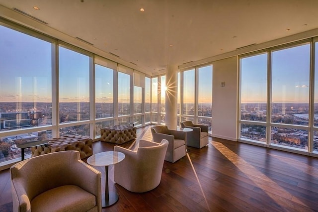 188 Brookline Ave Unit 23C, Boston, MA 02215 - sunroom with floor to ceiling windows, wood-type flooring, and a city view