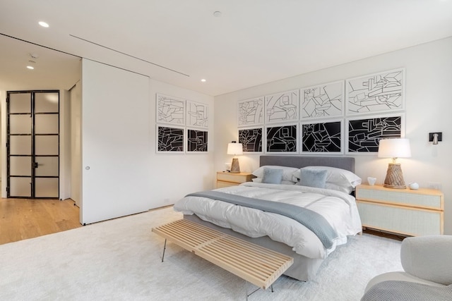 bedroom with light wood-type flooring